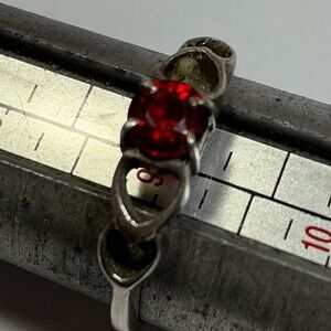 Sterling Silver Ring with a red stone . Size 9